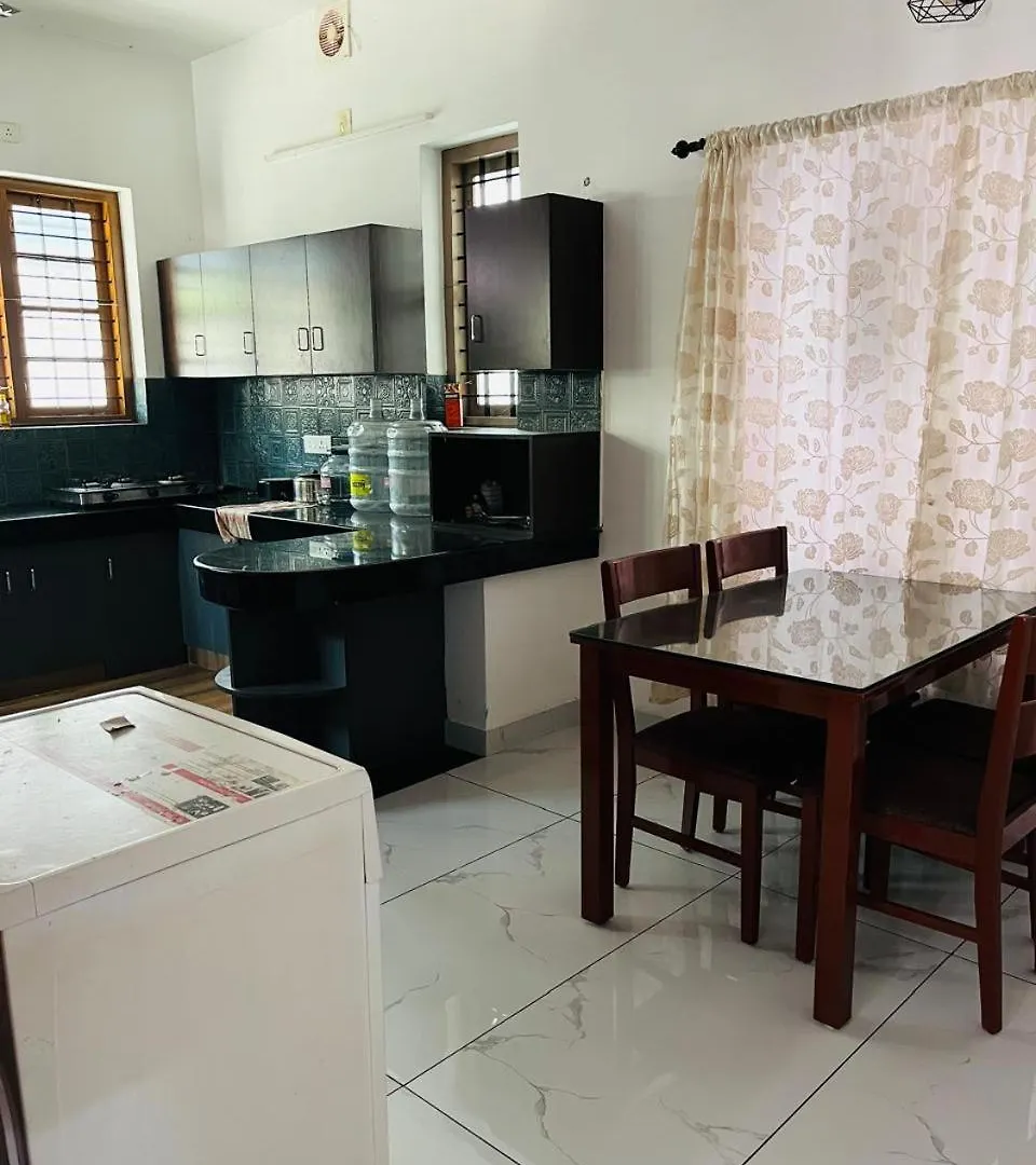 アパート Trivi Property Home Stay トリバンドラム